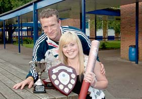 Multi-award winner Kelly Howells with paralympian Richard Whitehead.