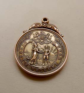 •The Lydney Welcome Home medal which fetched £200.