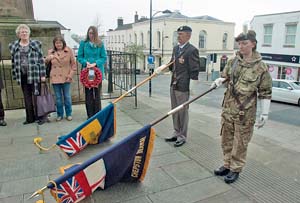 •Members of William Williams’s family, Carol Dutson, Sandra Boshein and Sharon Putwain, watch as the Royal Naval Association and British Legion standards are dipped by the appropriately-named William Williams and army cadet Charli Juett of Beachley,