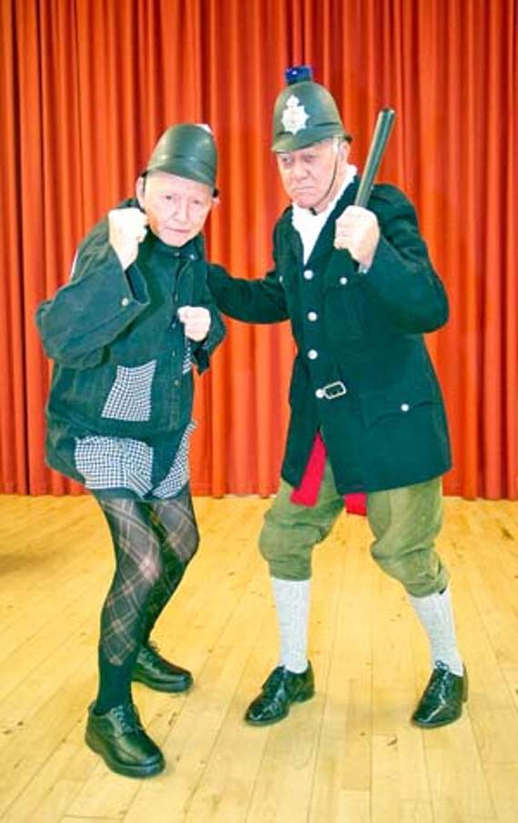 •Policemen Terry Burton and Don Bent.