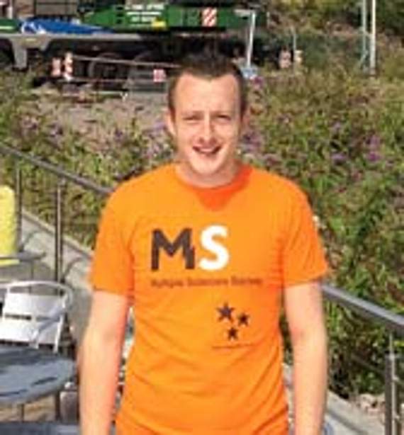 •Back on the ground…fundraiser Mark Beddis.