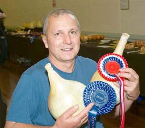•Andy Perry with his entries for the heaviest onion.