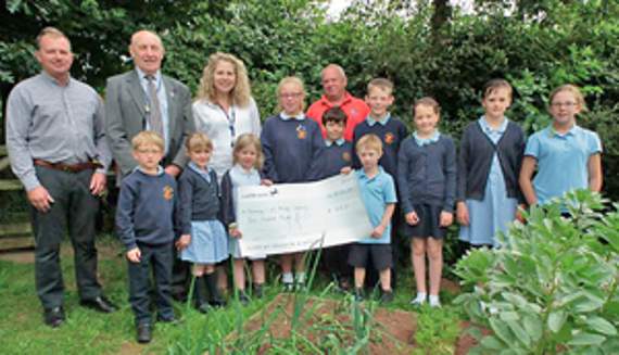 • Councillor Terry Hale and some of the pupils of Steam Mills Primary School, Cinderford.