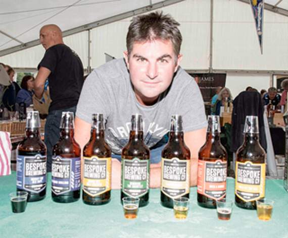 •Andrew Coe with some of the products of Bespoke Brewery in Mitcheldean.