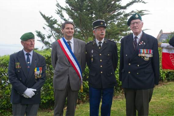 n The French parade marshall (left) with Mayor Erven Leon, gendarmes chaplain Christophe Eskdale and his father John Eskdale from Whitecroft, who survived the sinking three-quarters of a century ago.