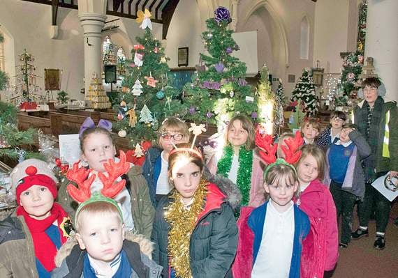 Gather round the Christmas trees