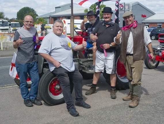 The Massey (Ferguson) Men of Ross with one of their vintage tractors.
