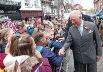Charles raises cheers and beer
