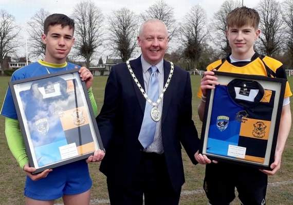 Cllr Nick Penny, Mayor of Coleford, welcomes the captains of both rugby teams.