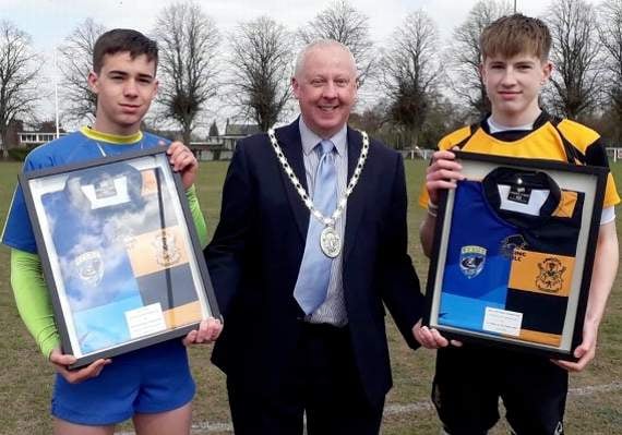 Cllr Nick Penny, Mayor of Coleford, welcomes the captains of both rugby teams.