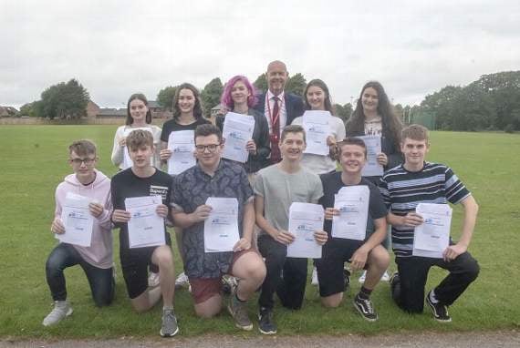 Some of Five Acres High’s best performers with headteacher Ian Frost.