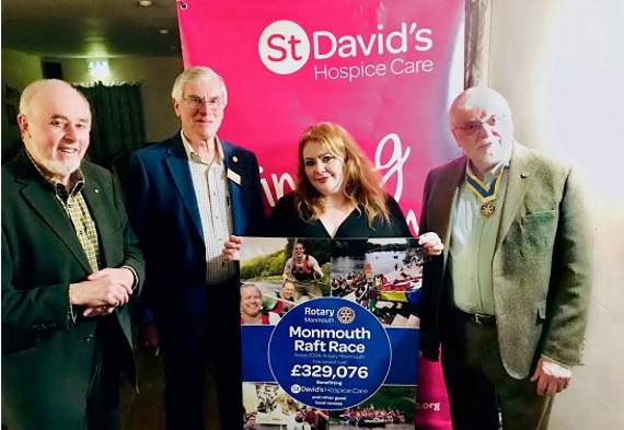 Monmouth Rotarians (from left) Pete Walters, Norman Williams and Terry Ing hand over a cheque for £16,007 to Emma Saysell of St David’s Hospice Care.