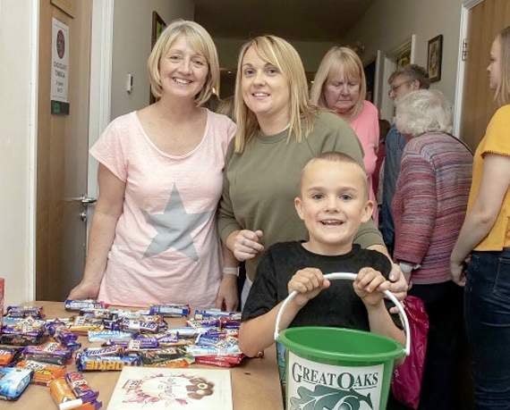 Jackie Morris and Ann and Harry Hurcombe on the chocolate tom bola.