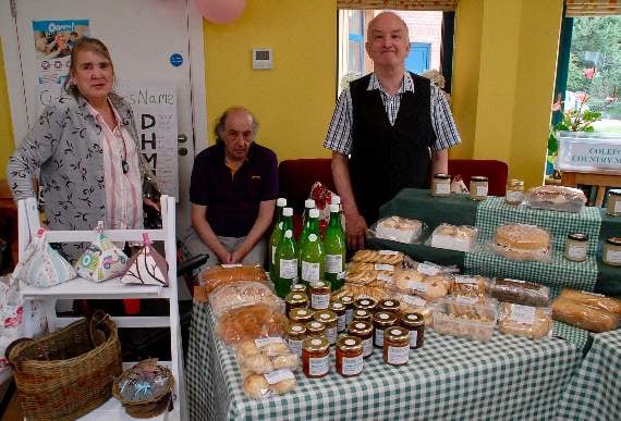 Dora Matthews residents Barbara Hogg, Alan Dewick and Phillip Oliver eye up the products on offer at the farmers’ market.