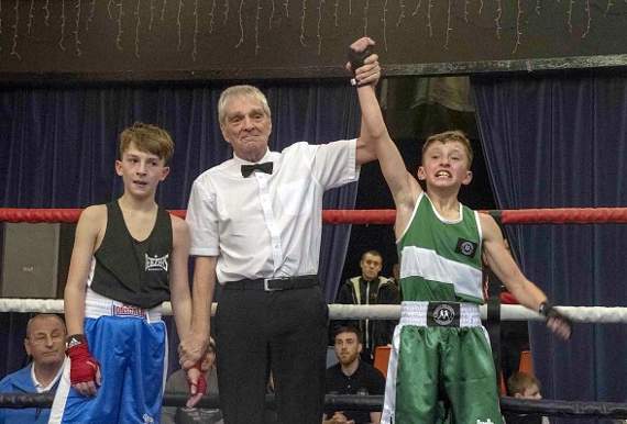 Young Joby Fissenden celebrates his win over Thomas English of Devizes.