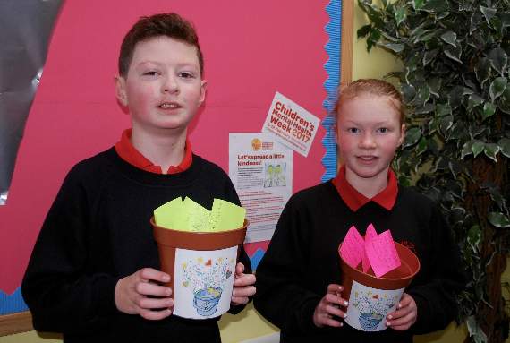 Anagh Coar School’s head boy Connor Corrin, 11, and head girl Kelsey Crellin, 10, with buckets of positive thoughts to add to the school display