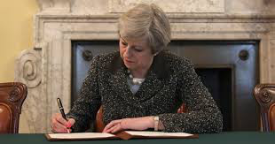 Theresa May signs the letter triggering Article 50