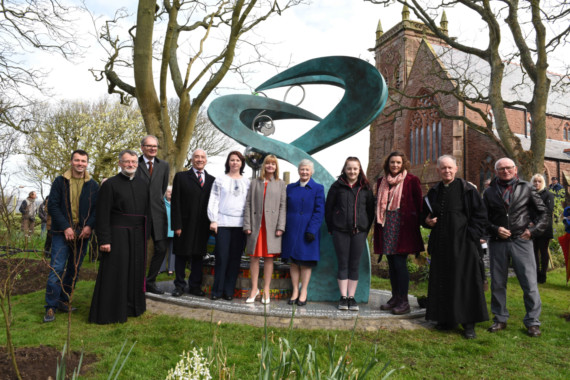 The official unveiling of the Knockaloe sculpture and the 20th Century gardens at St German's Cathedral in Peel - left to right: Chris Stokes, Reverend Nigel Godfrey, Dr Richard Arnin, Leonard Singer, Karolina Davison, Angela Patchett, Clare Christian, Megan Wakon, Vicky Harrop, Ian Folds, Kenny Stokes
