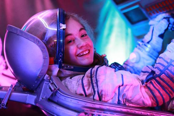 Caitlin Gelder inside the space capsule