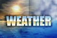 Met Office lifts the amber warning in the island while heavy snow falls in parts of England and Wales