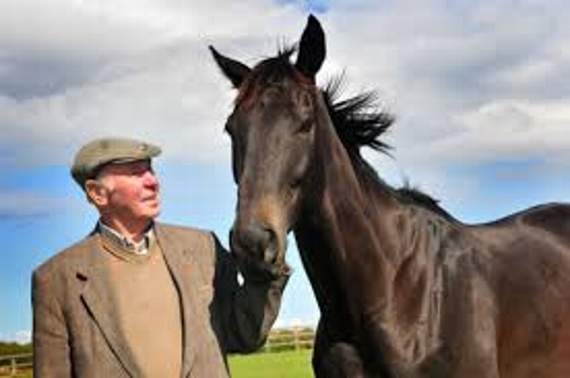 Many Clouds with his owner Trevor Hemmings on 'holiday' in the Isle of Man. The horse was a firm favourite with Manx punters