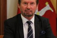 Members question minister's figures