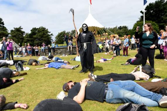 THe Grim Reaper leads the climate change protest