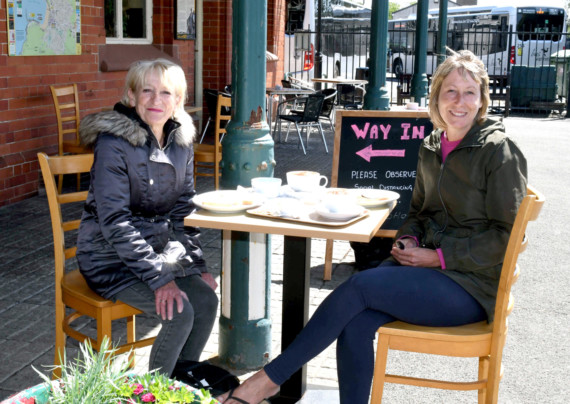 Port Erin is back in business - customers Elaine Watterson and Sarah Appleby at the Whistle Stop coffee shop at Port Erin railway station