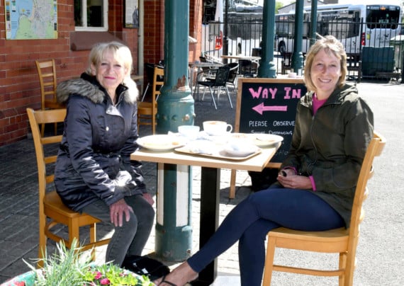Port Erin is back in business - customers Elaine Watterson and Sarah Appleby at the Whistle Stop coffee shop at Port Erin railway station