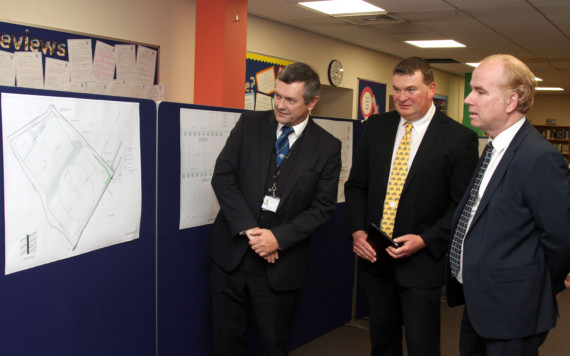 Plans for the proposed new playing fields at Castle Rushen School Castletown.L to R.Graham Cregeen MHK, Jason Moorehouse MHK and Richard Collister Estates Director explains about the plans.