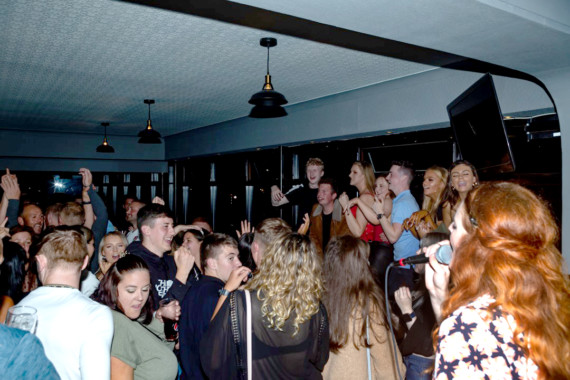 Rebecca Forrest plays to the crowd at the Mitre Hotel (Isle Photo)
