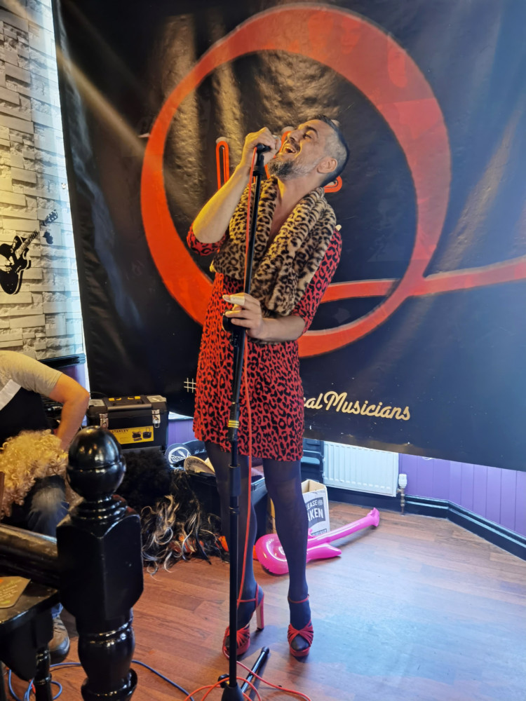 Musicians play at the Quids Inn open mic night