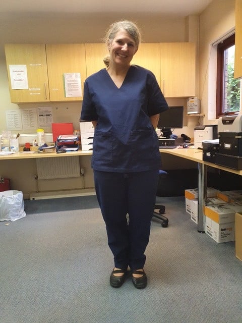 Dr Helen Freer wearing scrubs made by those involved in the SCRUBS initiative