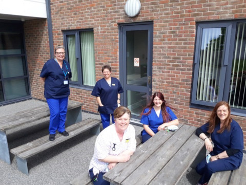 NHS workers in their scrub uniforms made by those part of the SCRUBS initiative during the pandemic