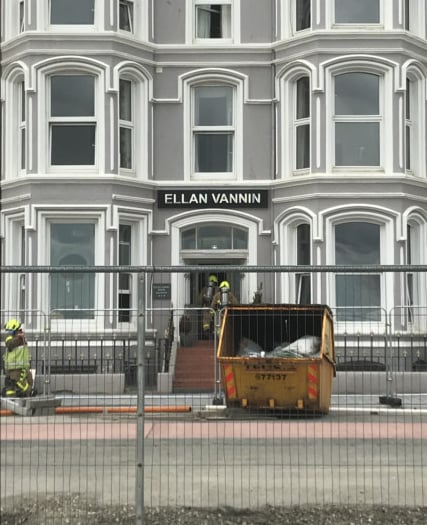 Fire crews bring woman to safety from hotel fire