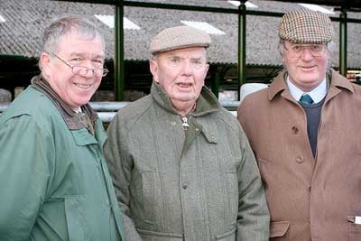 AMONG FRIENDS: Bill Wood (centre) at 84 years young is pictured with show president Clive Morgan (right) and show secretary Peter Farnsworth at the Newton Abbot Market, on Wednesday.