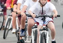 Town takes cycle tour race to its heart