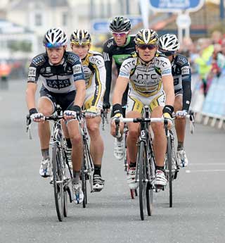 MADE IT: Five cyclists come in on the home straight. Picture Alan Craig