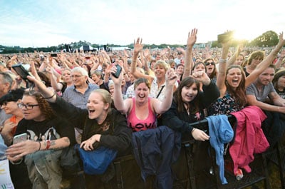 Fans having a ball at the gig.