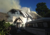 Thatched properties destroyed in blaze as 120 firefighters battle in vain
