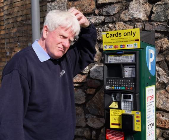 CONFUSED: Punter Bob Doubleday… beaten by the complexity of a malfunctioning parking meter.