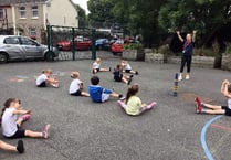 Youngsters being taught a thing or two by award-winning trampolinist Kirsty Way.