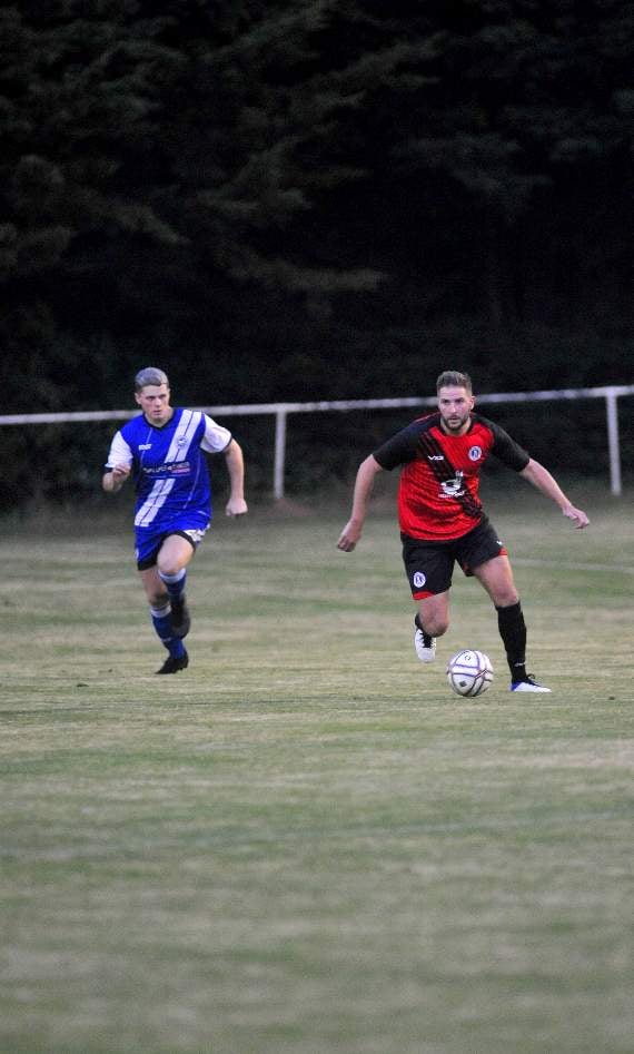 Action from Newton Abbot Spurs' 2-1 defeat at Ottery St Mary on Wednesday night. Pictures by Steve Pope.