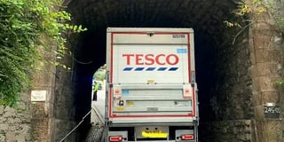 Trains cancelled after Tesco lorry hits rail bridge