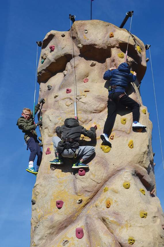 Don’t look down! Welton pupils reach the top of their climb. Photo: Stan Bull