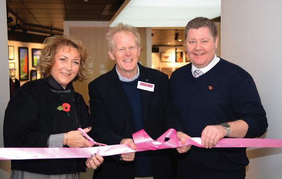 Photos: Will Nicol Suzanne Burgess (Radco Director) and Jonathan Rich (right) also a Director of Radco, cut a ribbon, aided by Neale Mellersh (Gallery Manager), to officially open the Old Bakery Artist’s Gallery in the Radco store.