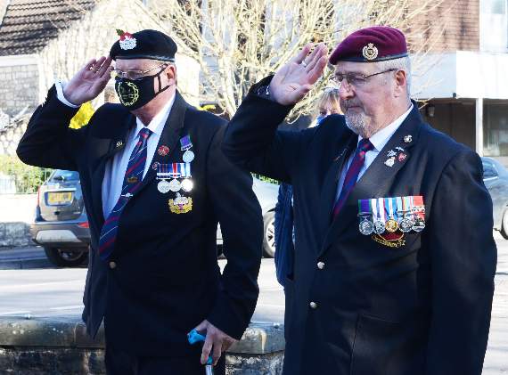 Photos: Will Nicol. Royal British Legion Members, Chris Copeland and Graham Jagger, salute the fallen at the Radstock ceremony.