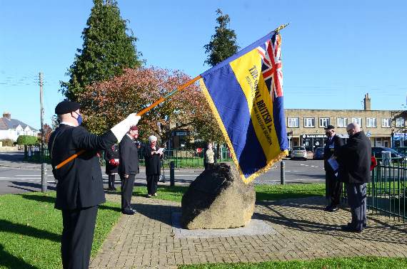 The Standard is lowered to mark the two minute silence at the Westfield Memorial.