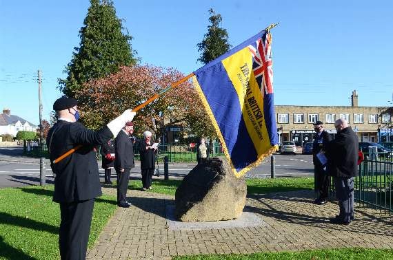 The Standard is lowered to mark the two minute silence at the Westfield Memorial.