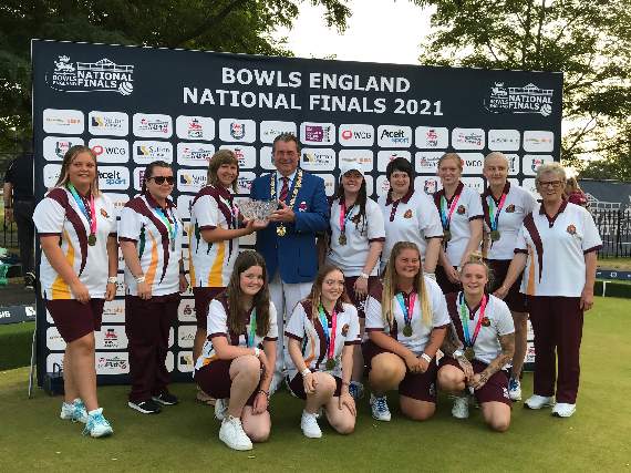 The Scrumpies receiving the Amy Rose Bowl.
